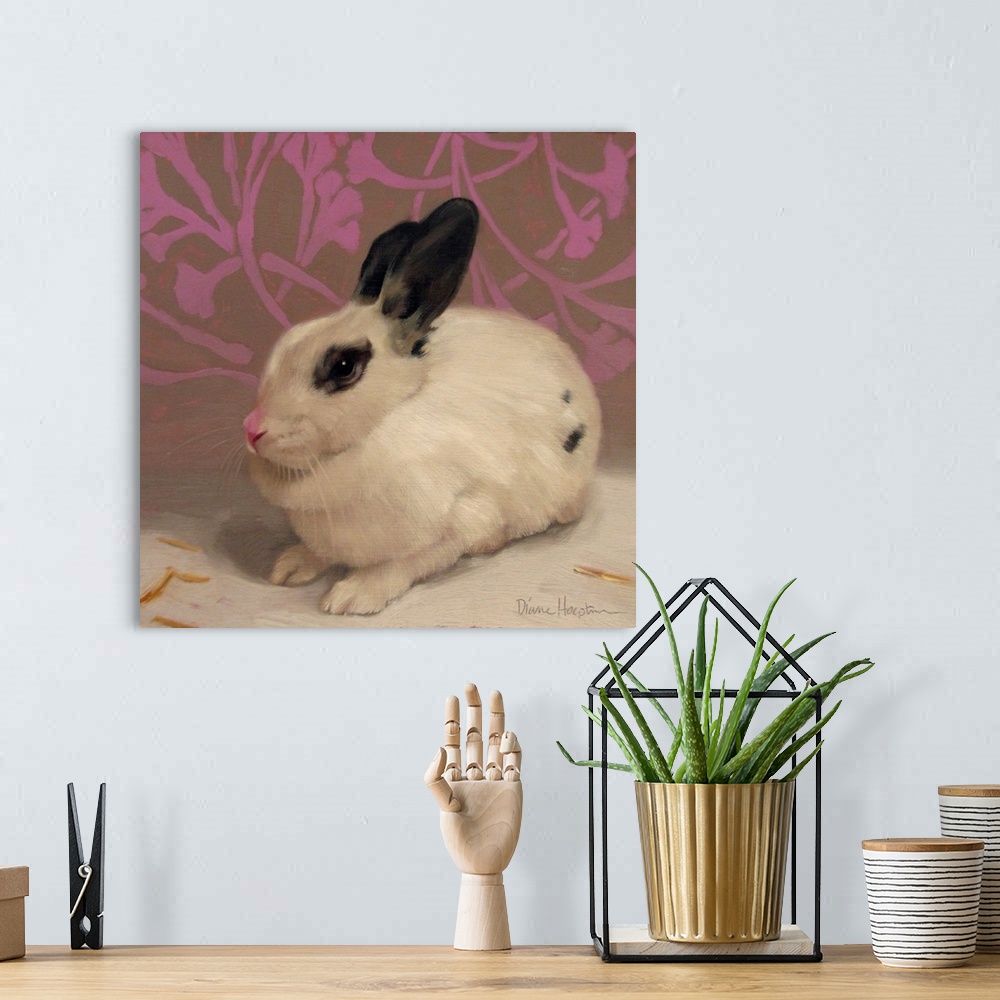 A bohemian room featuring Contemporary painting of a white rabbit with black ears resting in front of a purple floral wall.