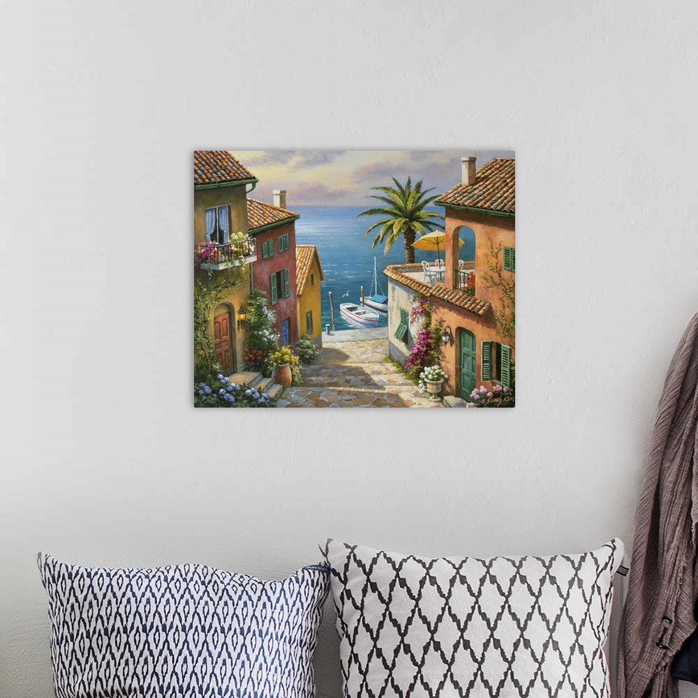 A bohemian room featuring Contemporary painting of an idyllic rural European village scene.