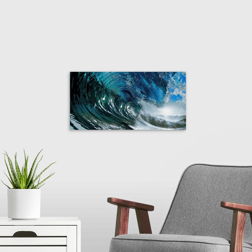 A modern room featuring Panoramic photo of the inside of a large wave in the ocean before it breaks.