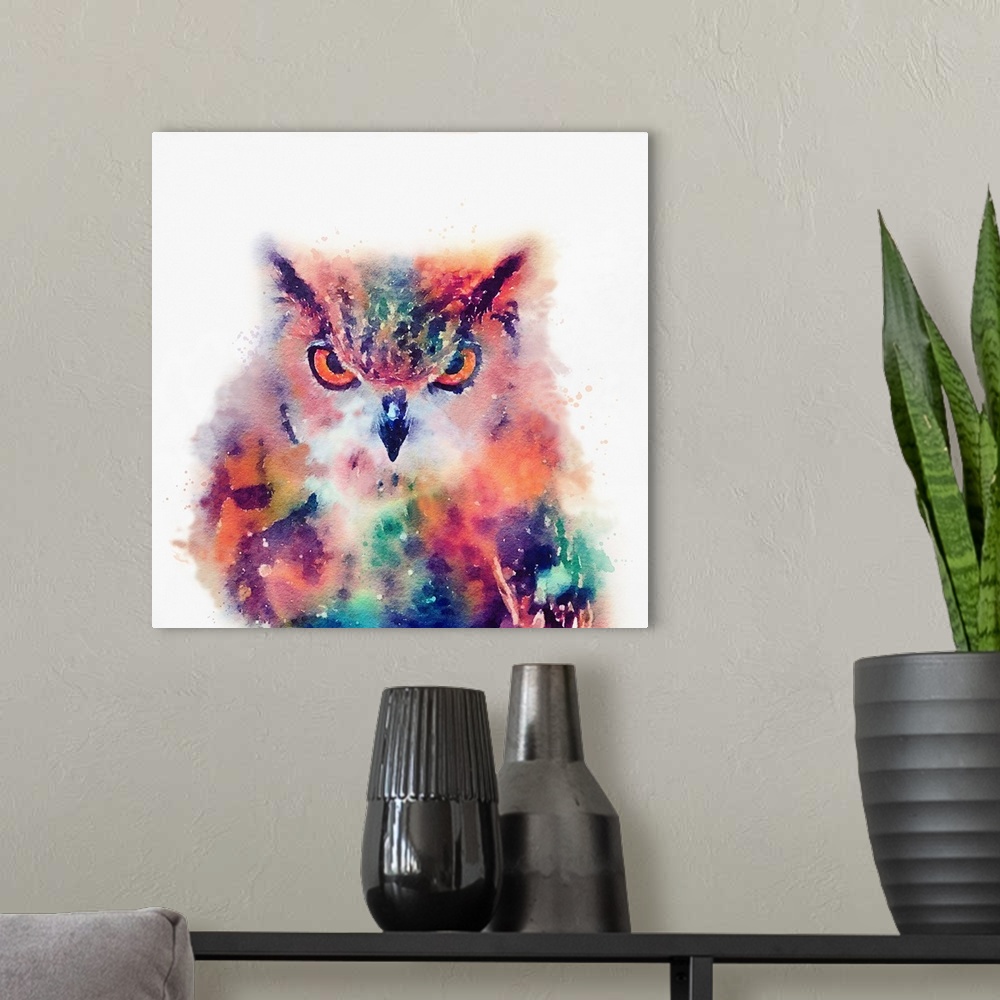 A modern room featuring A watercolor painting of an owl in vivid multi-colors.