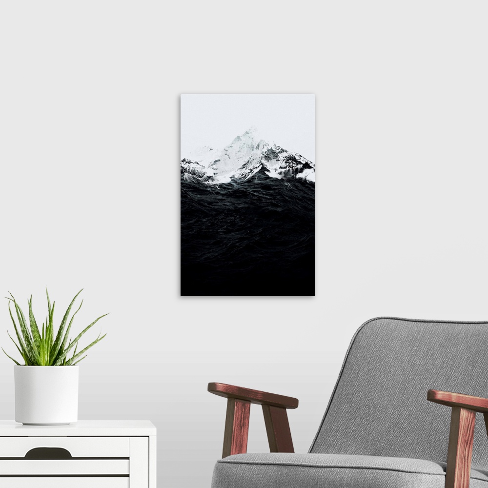 A modern room featuring Double exposure artwork of a mountain peaks and ocean waves.