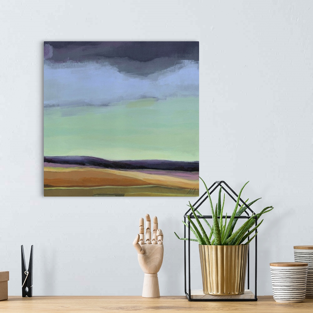 A bohemian room featuring Contemporary painting of an abstract landscape.
