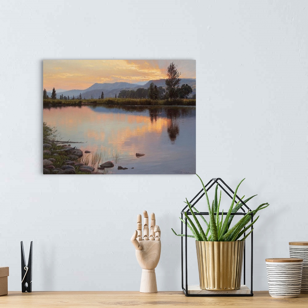 A bohemian room featuring A contemporary landscape painting of a lake at sunset reflecting the surrounding trees