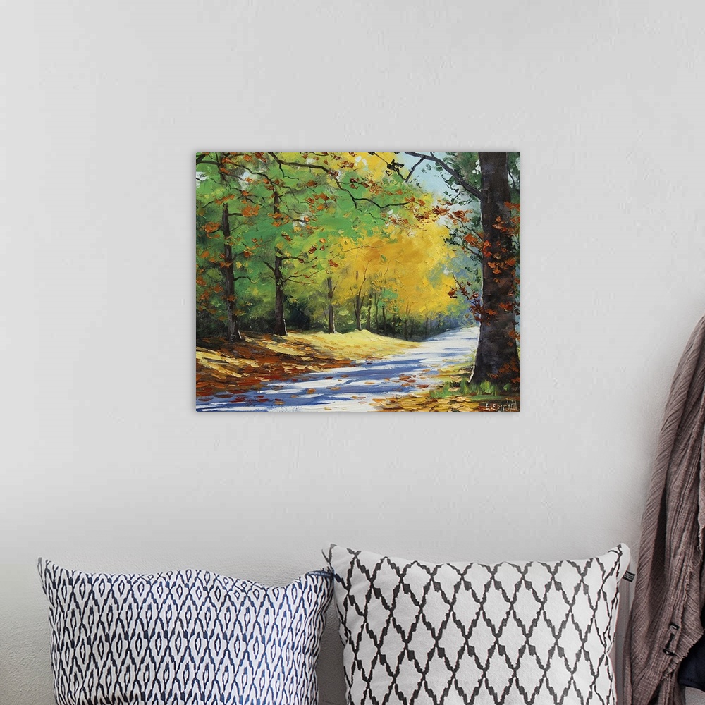 A bohemian room featuring Contemporary painting of an idyllic countryside road cutting through autumn foliage.