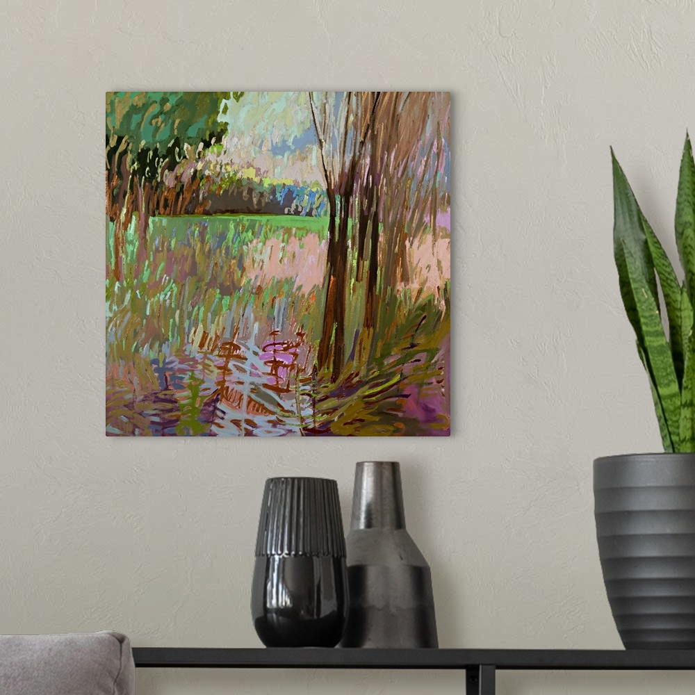 A modern room featuring Contemporary landscape painting of a field surrounded by trees.