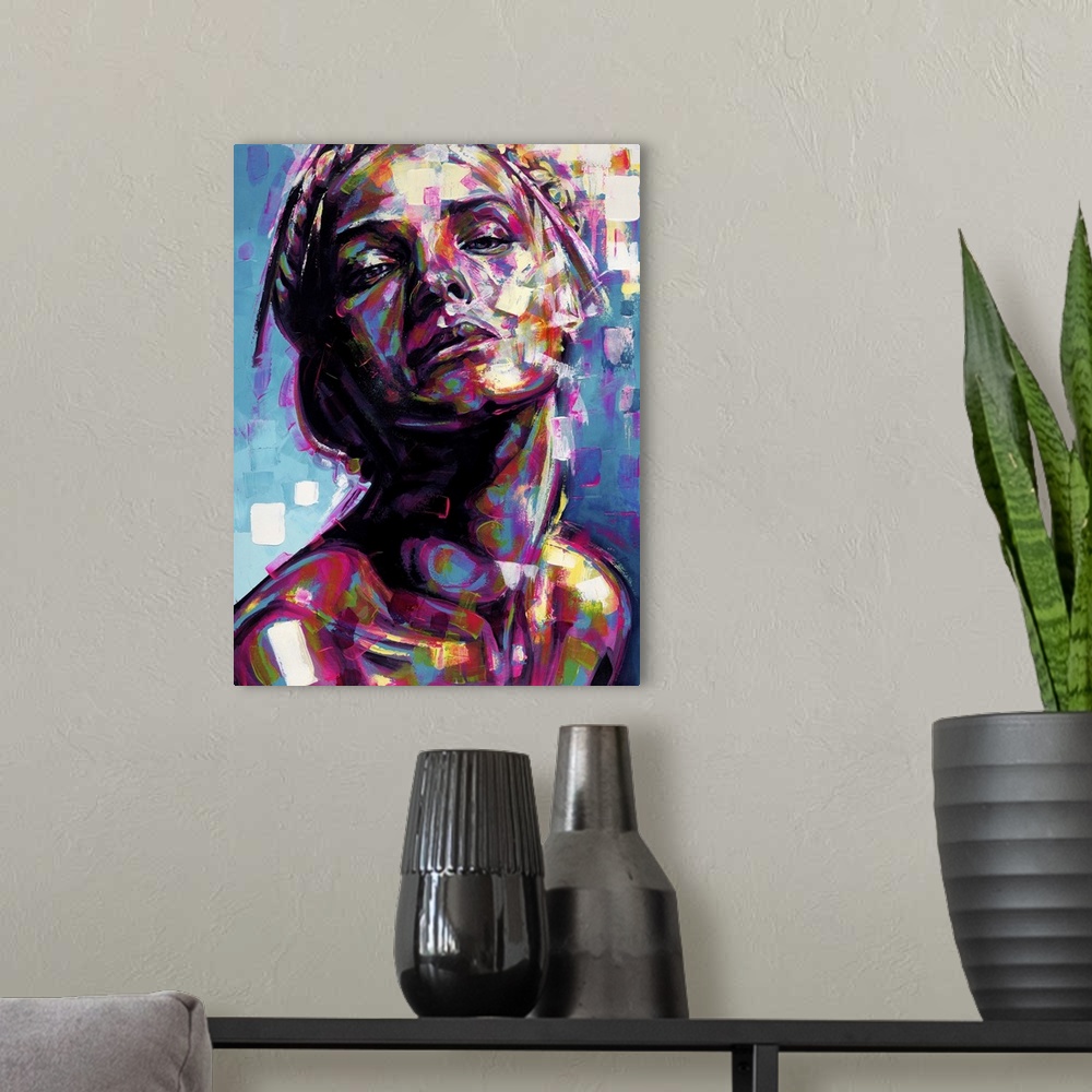 A modern room featuring Vertical abstract portrait of a woman in vibrant colors.