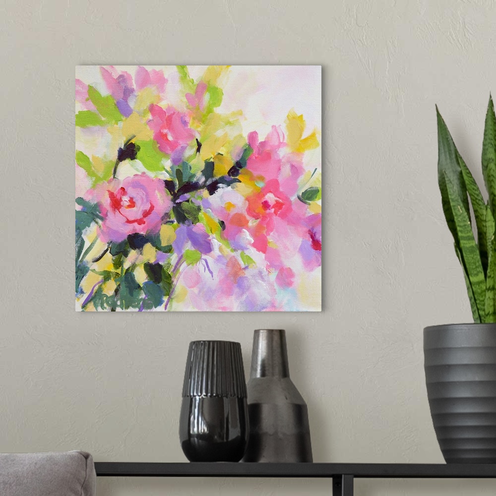 A modern room featuring A square contemporary painting of bright roses in pink.
