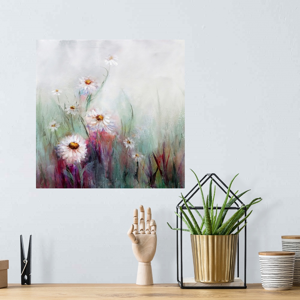 A bohemian room featuring An ethereal painting of white oxeye daisies mixed with tones of pink in front of a misty white ba...
