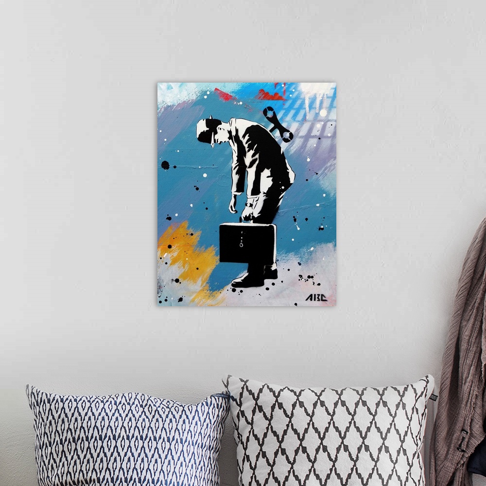 A bohemian room featuring Urban painting of a business man with a wind-up key in his back.
