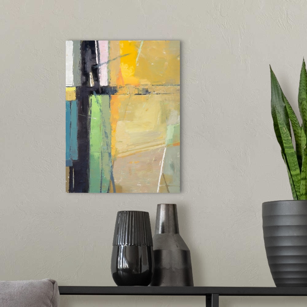 A modern room featuring Contemporary abstract painting using multiple colors in warm and cool tones.