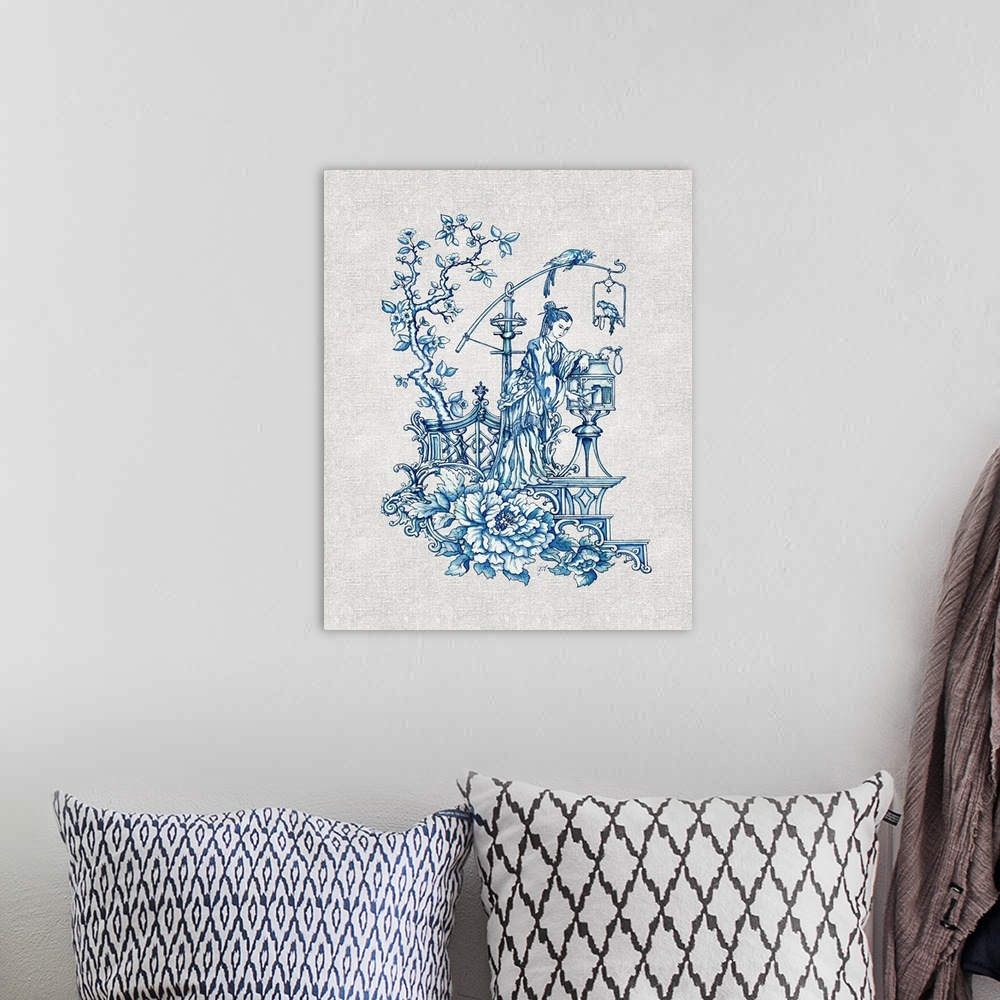 A bohemian room featuring Chinoiserie featuring a mother and child in blue over a linen background.