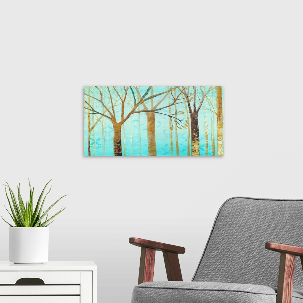A modern room featuring Contemporary artwork of brown trees against a teal background sky.