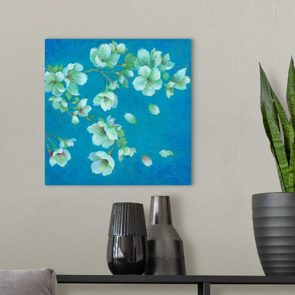 A modern room featuring Contemporary artwork of cherry blossoms against a teal blue background.
