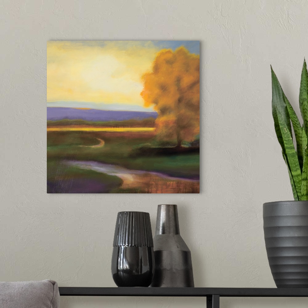 A modern room featuring Contemporary painting of golden fall tree on a river in the country.