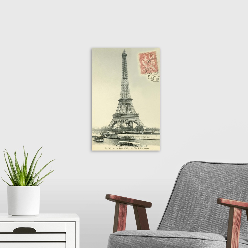 A modern room featuring Vintage postcard of the Eiffel Tower in Paris, France, with a postage stamp on the front.