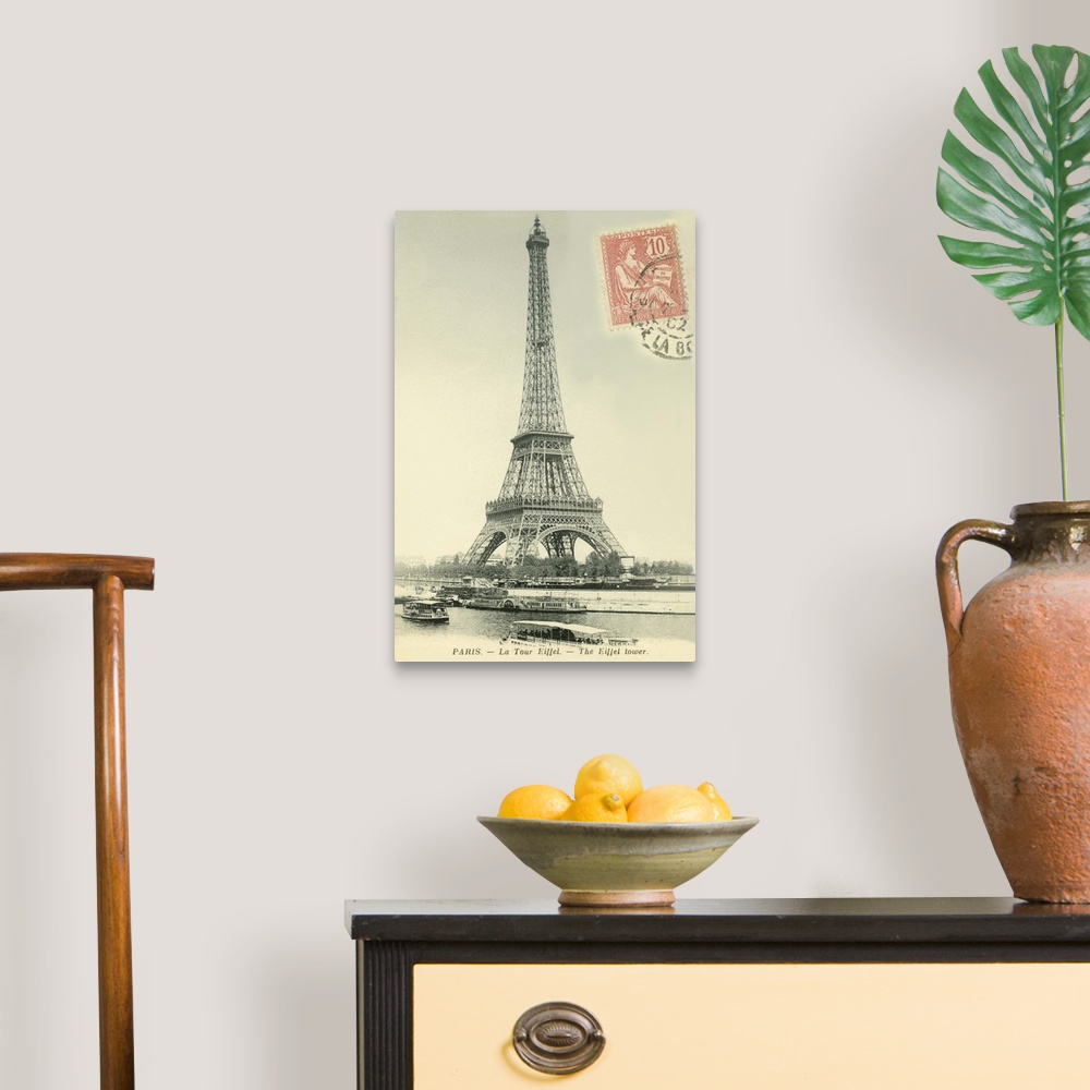 A traditional room featuring Vintage postcard of the Eiffel Tower in Paris, France, with a postage stamp on the front.