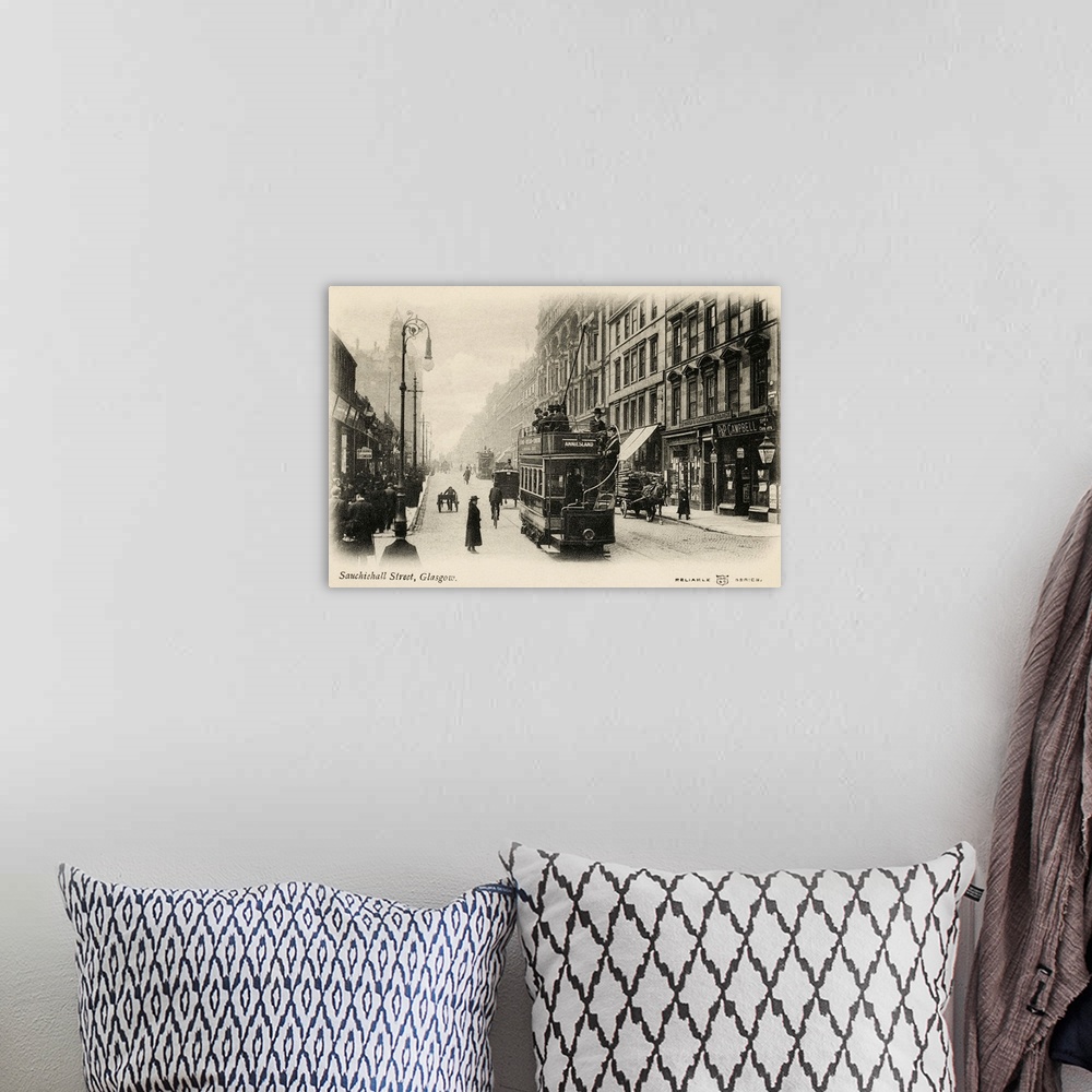 A bohemian room featuring Vintage postcard of a street in Glasgow, Scotland, with a trolley.