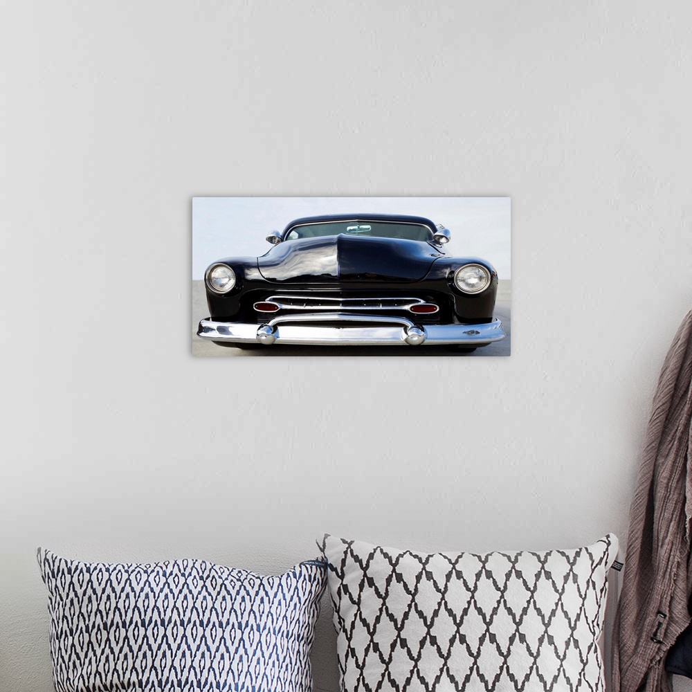 A bohemian room featuring Photograph in black and white of the front end of a classic hot rod.