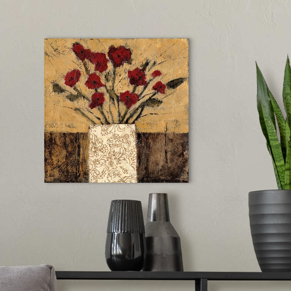 A modern room featuring Contemporary artwork of a bouquet of red flowers in a patterned vase.