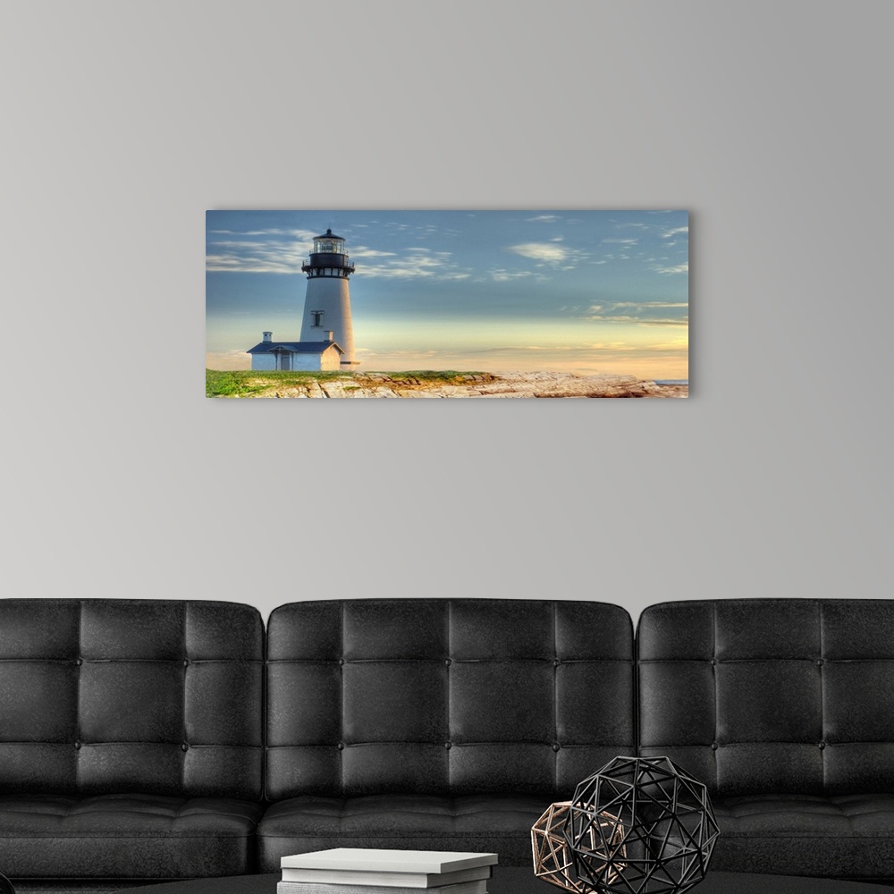 A modern room featuring Photograph of a lighthouse against a blue sky.