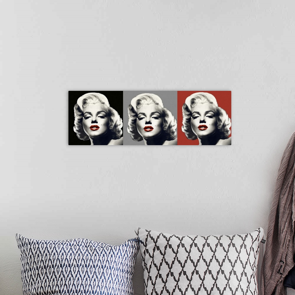 A bohemian room featuring Marilyn Monroe trio in black, white, gray, and red.