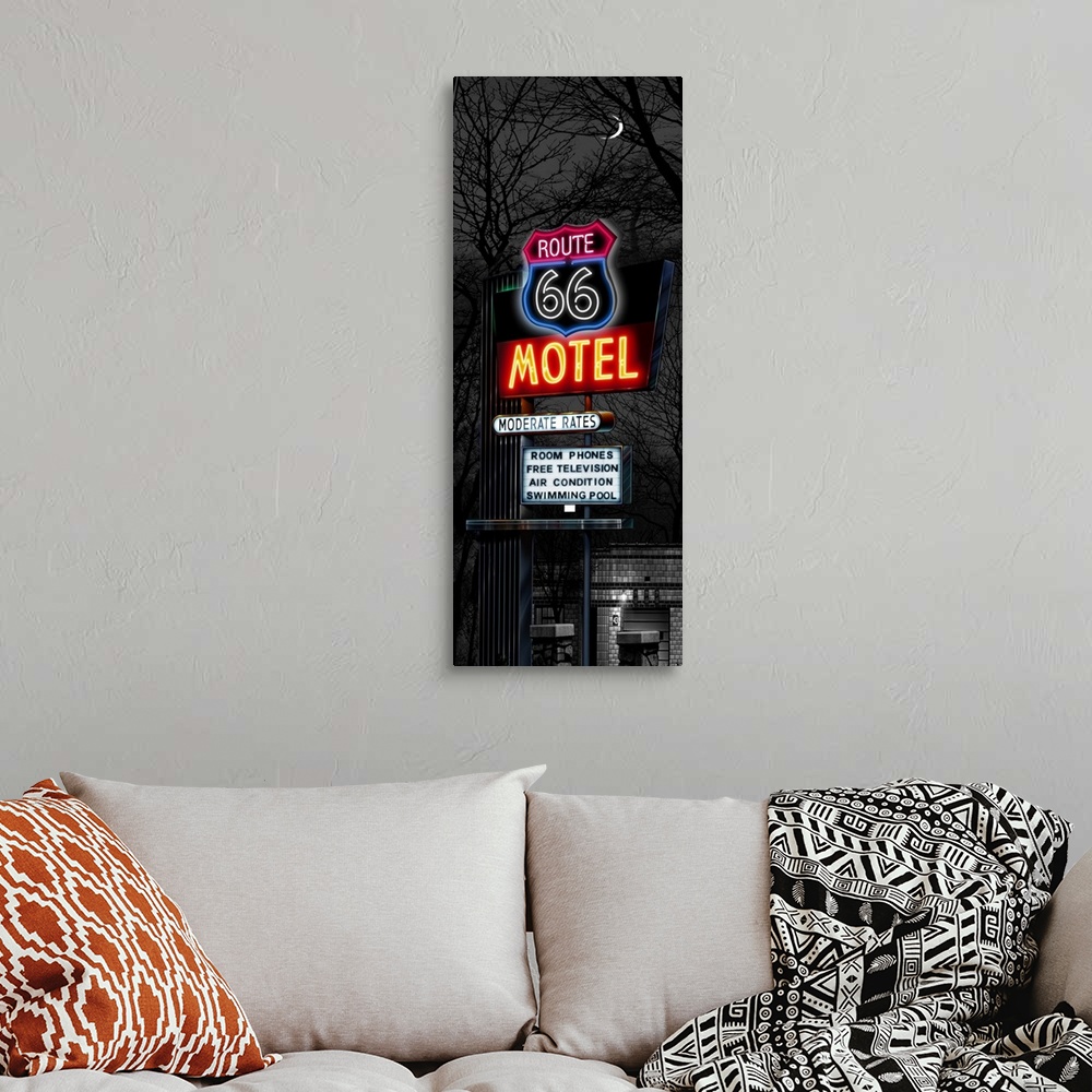 A bohemian room featuring Digital art painting in black and white with spot color of the Route 66 Motel sign at night by He...