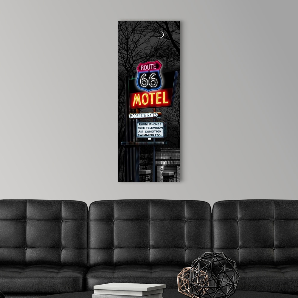A modern room featuring Digital art painting in black and white with spot color of the Route 66 Motel sign at night by He...