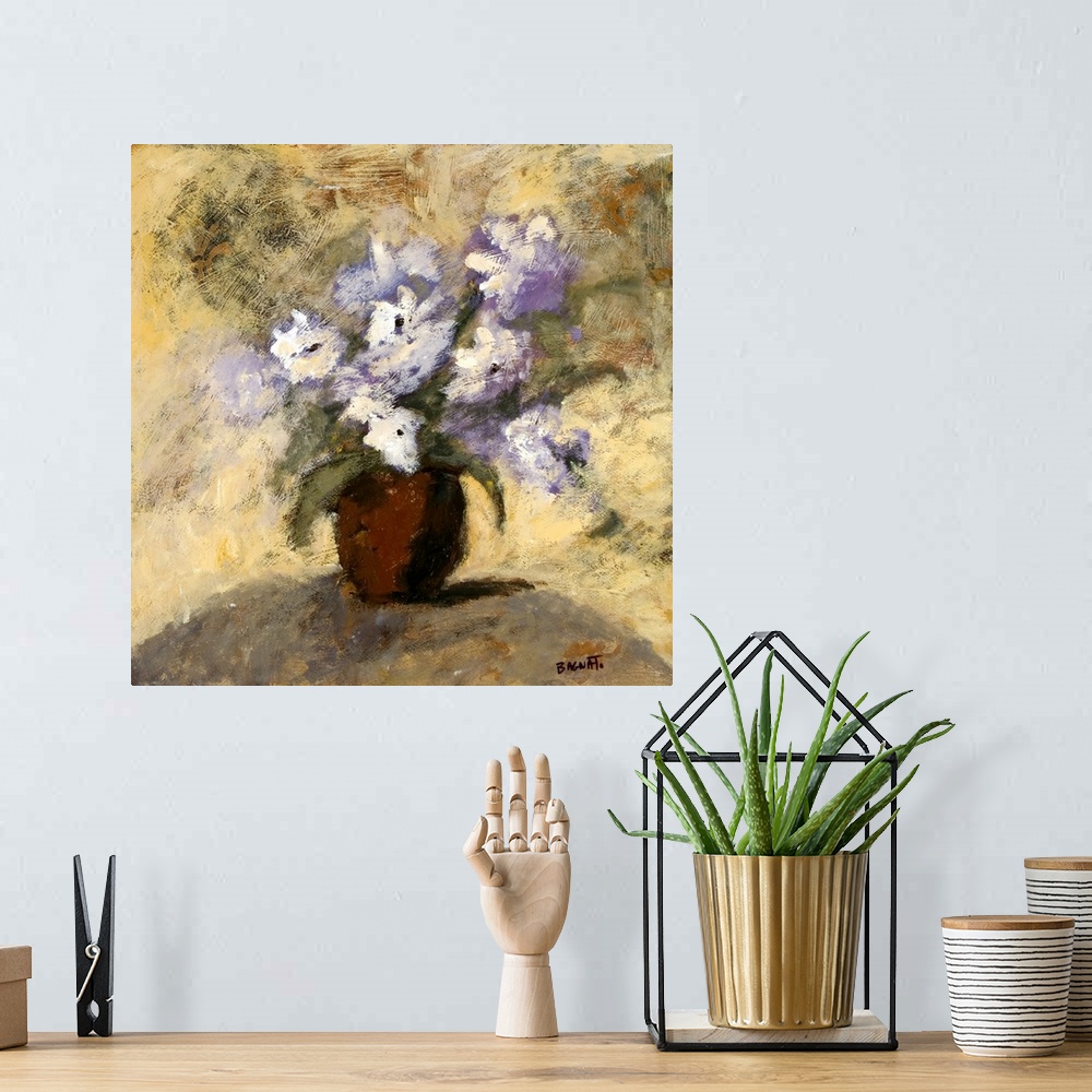A bohemian room featuring Fine art painting of an orchid on a table with a marble pattern background.