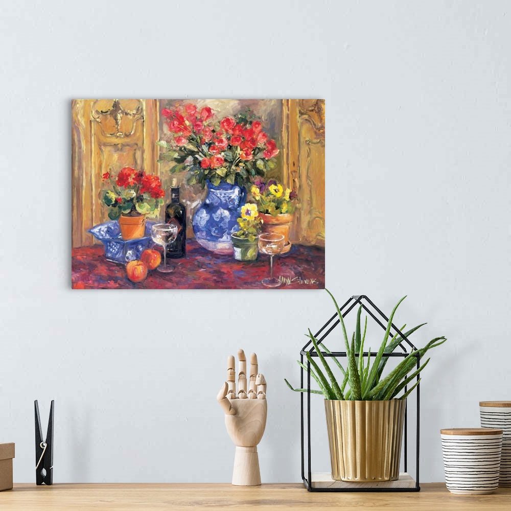 A bohemian room featuring Fine art oil painting still life of red roses, flowers, fruit and wine on a table by Allayn Stevens.