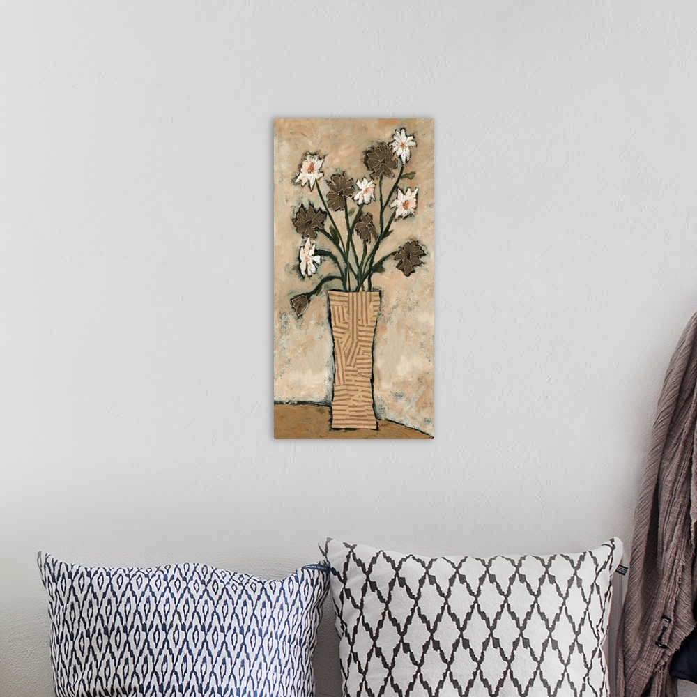 A bohemian room featuring Contemporary artwork of a bouquet of white and brown blooming flowers.