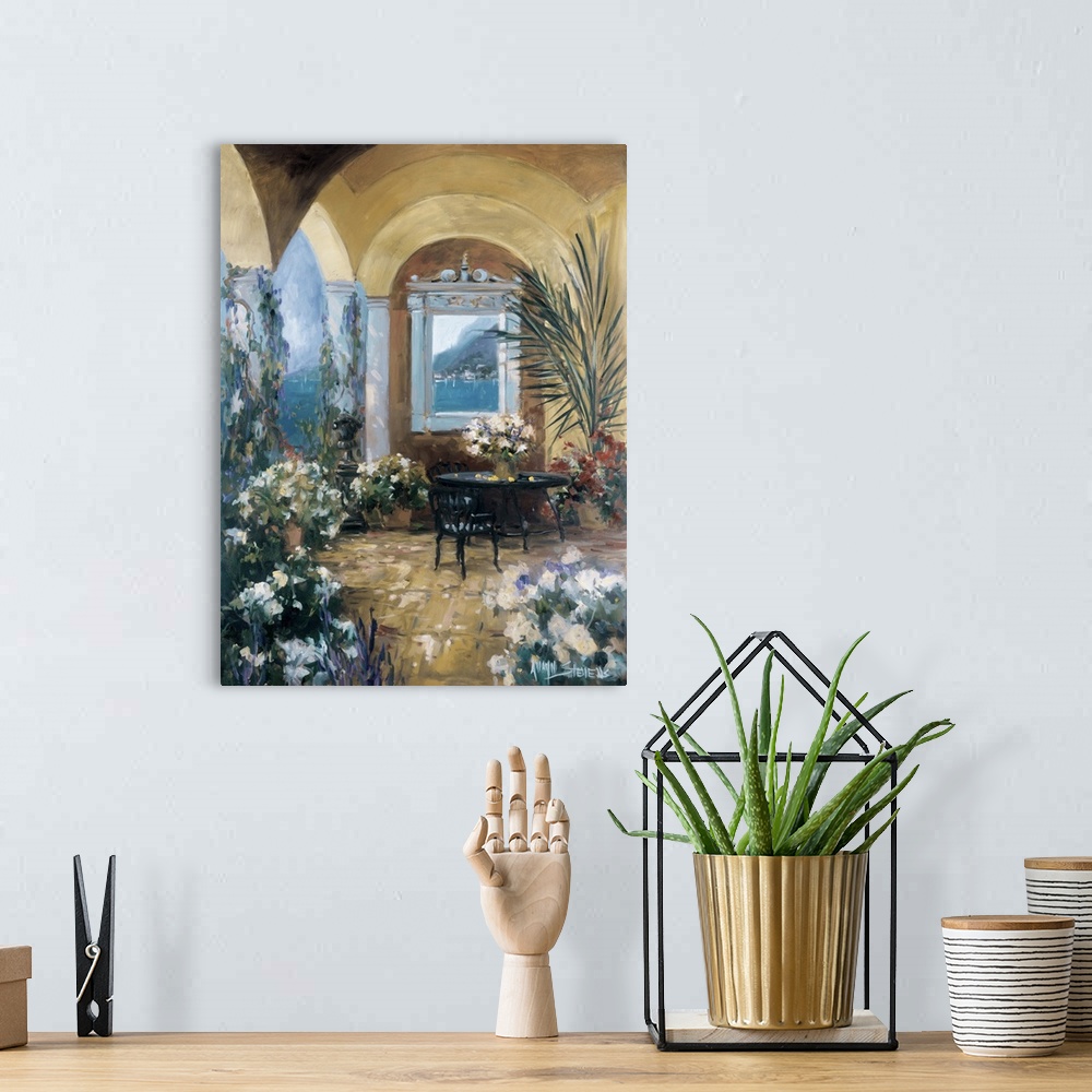 A bohemian room featuring Fine art oil painting landscape of an Italian courtyard terrace with flowering plants and a table...