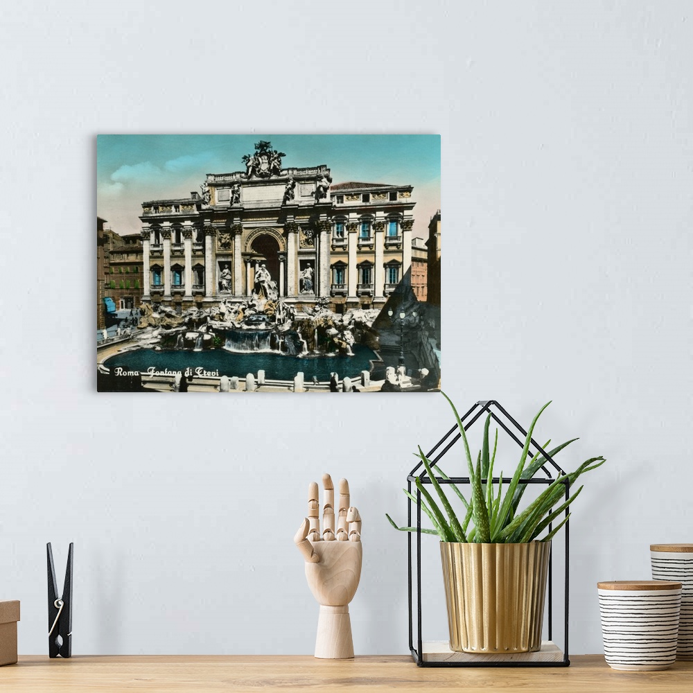 A bohemian room featuring Vintage postcard of the Trevi Fountain in Rome, Italy.