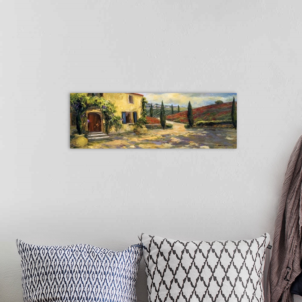 A bohemian room featuring Fine art oil painting landscape of a Tuscan farmhouse with hills of red rising in the background ...
