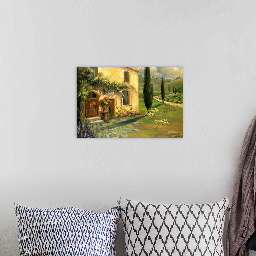 A bohemian room featuring Fine art oil painting landscape of a Tuscan farmhouse with lush green hills rising in the backgro...