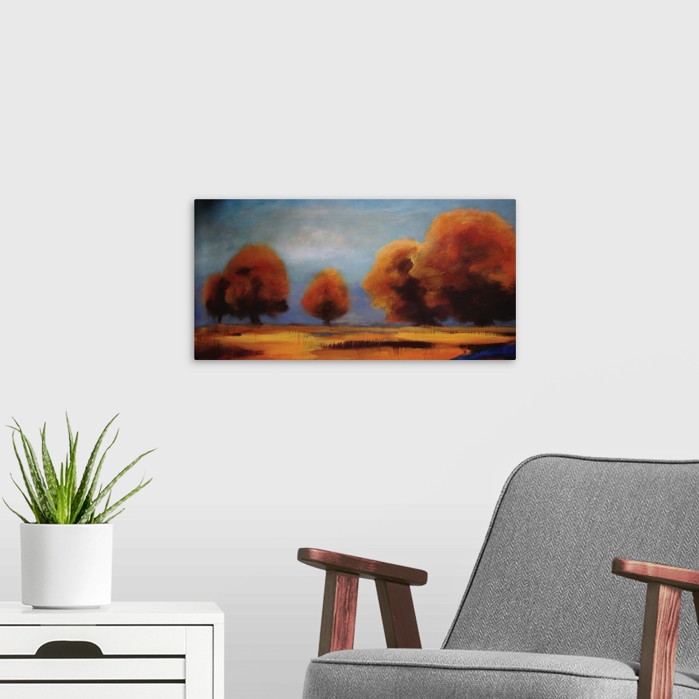 A modern room featuring Contemporary artwork of brightly colored fall trees against a shaded blue sky.