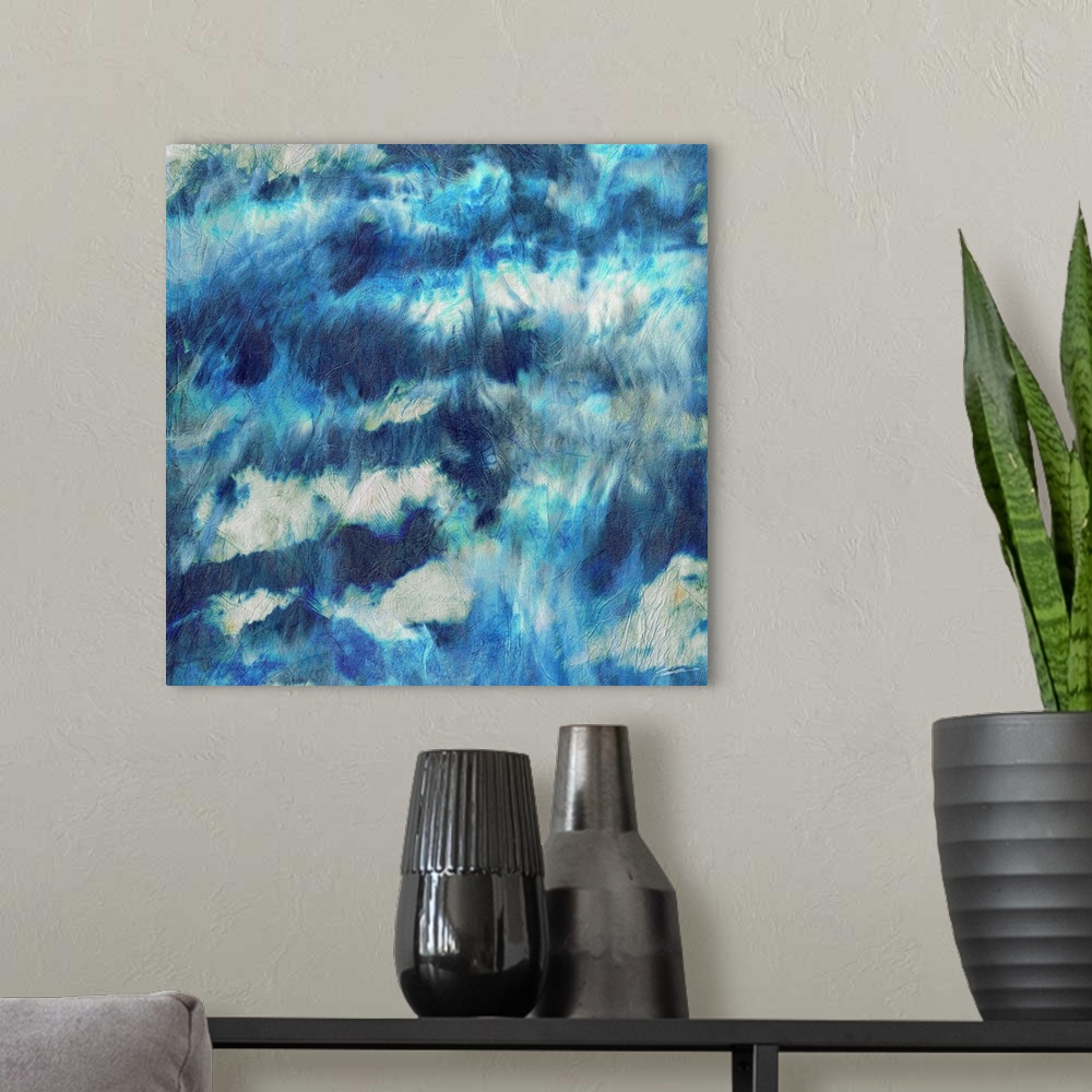 A modern room featuring A shibori painted skyscape with iridescent strokes of rainfall.