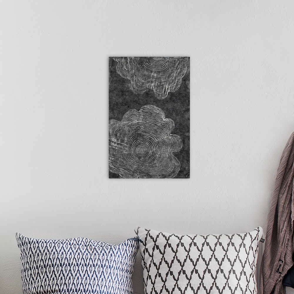 A bohemian room featuring A charcoal rubbing of ancient tree rings.