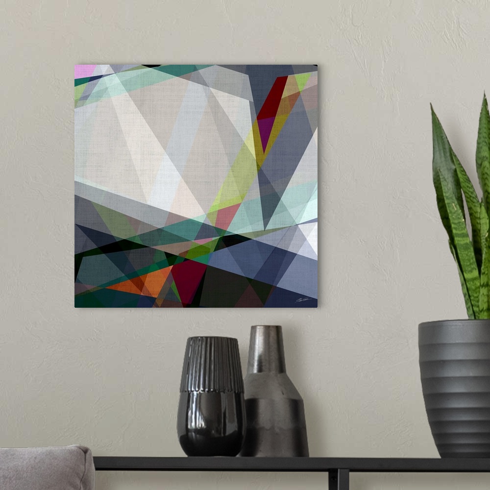 A modern room featuring A collage of intersecting angles of rich contemporary color.