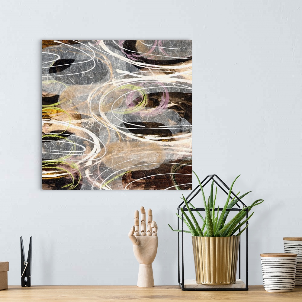 A bohemian room featuring A collage of rings dancing across a golden pond.