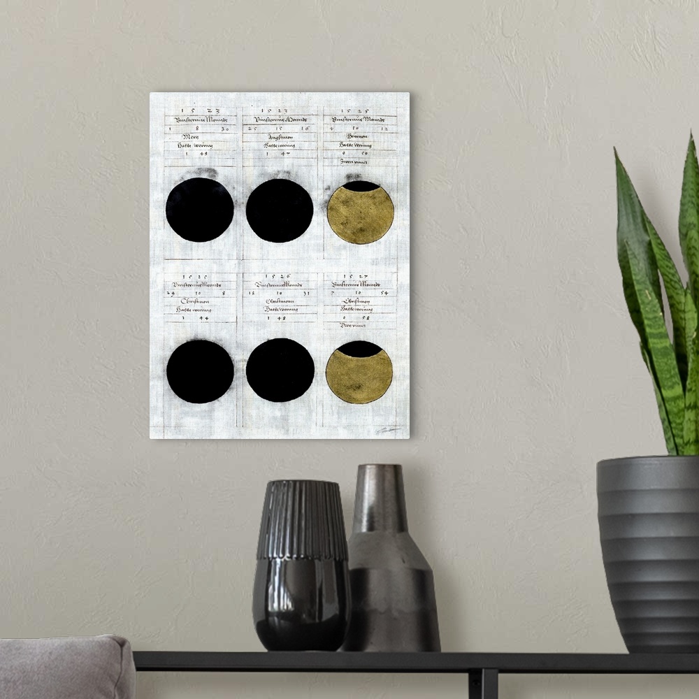A modern room featuring Vintage book plates indicating phases of the moon.