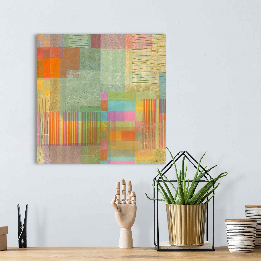 A bohemian room featuring A mid-century modern collage of colors and shapes reminiscent of a cityscape.