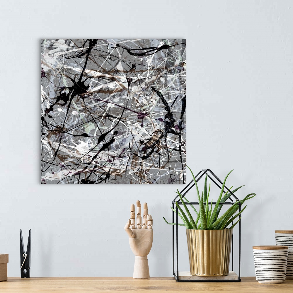 A bohemian room featuring An homage to the style of Jackson Pollock in black and white.