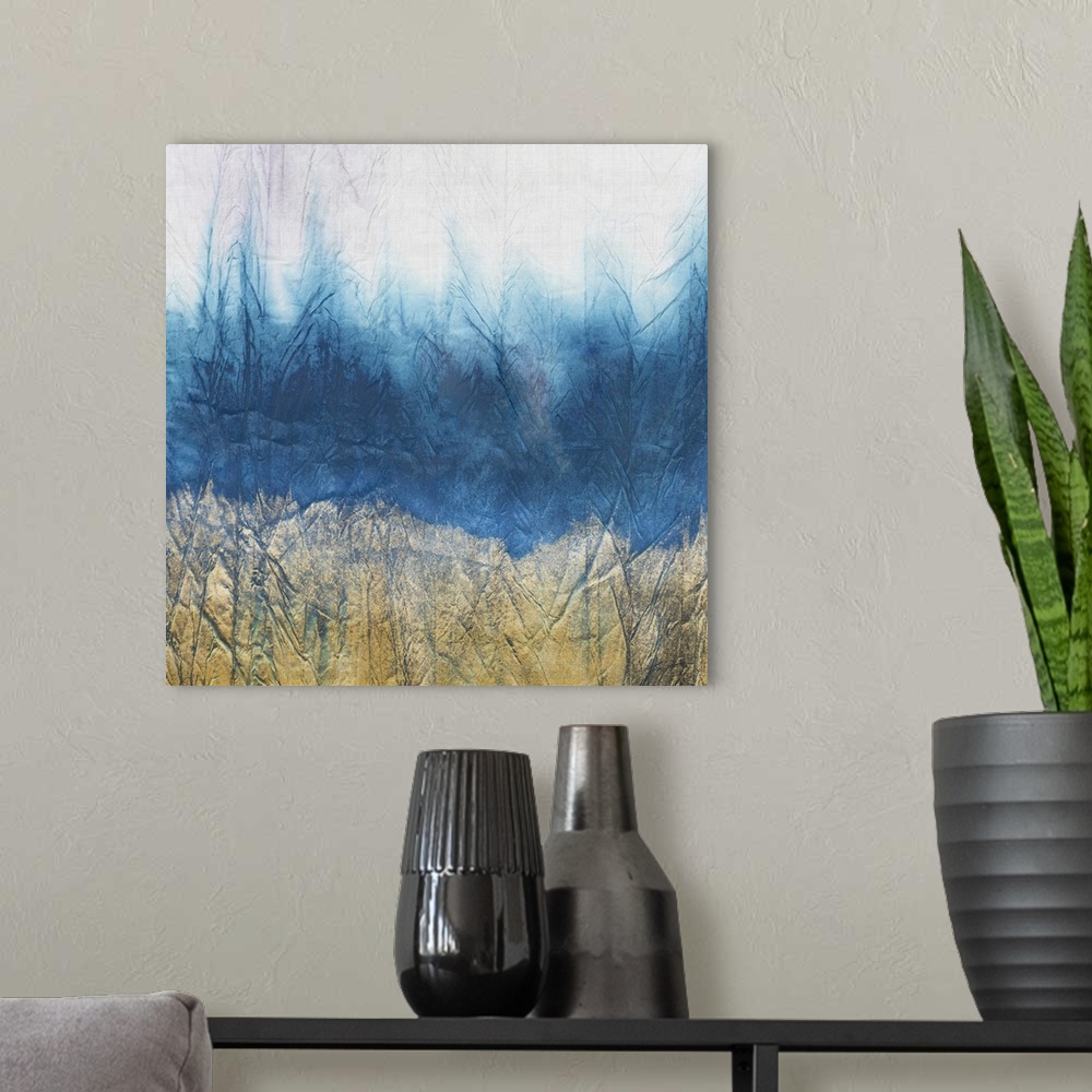 A modern room featuring A watercolored textured landscape with soft golden and indigo hues.