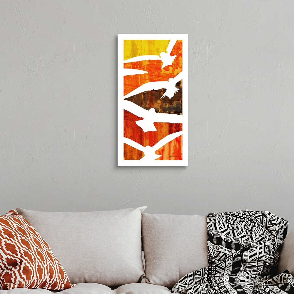 A bohemian room featuring Birds in-flight divide the canvas into orange and red blocks of color.