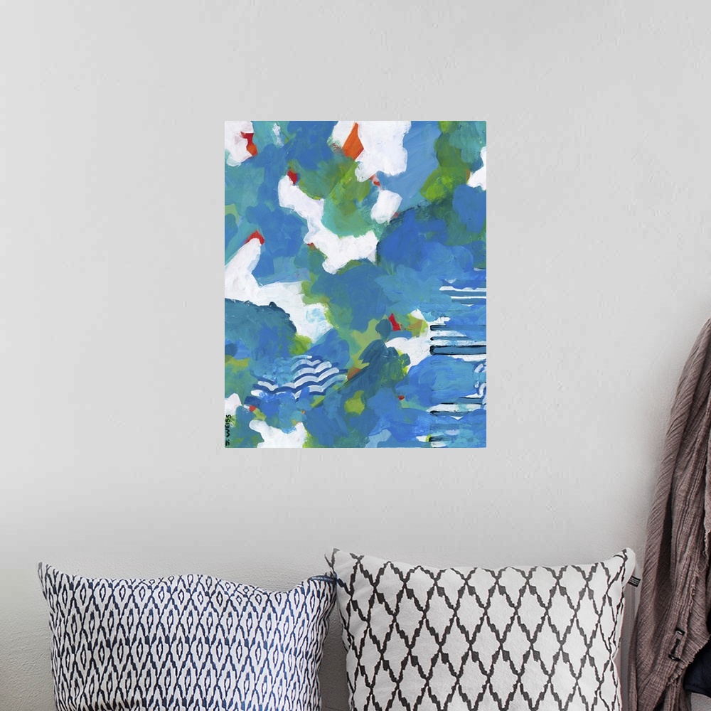A bohemian room featuring Blue and white contemporary abstract painting reminiscent of the ocean.