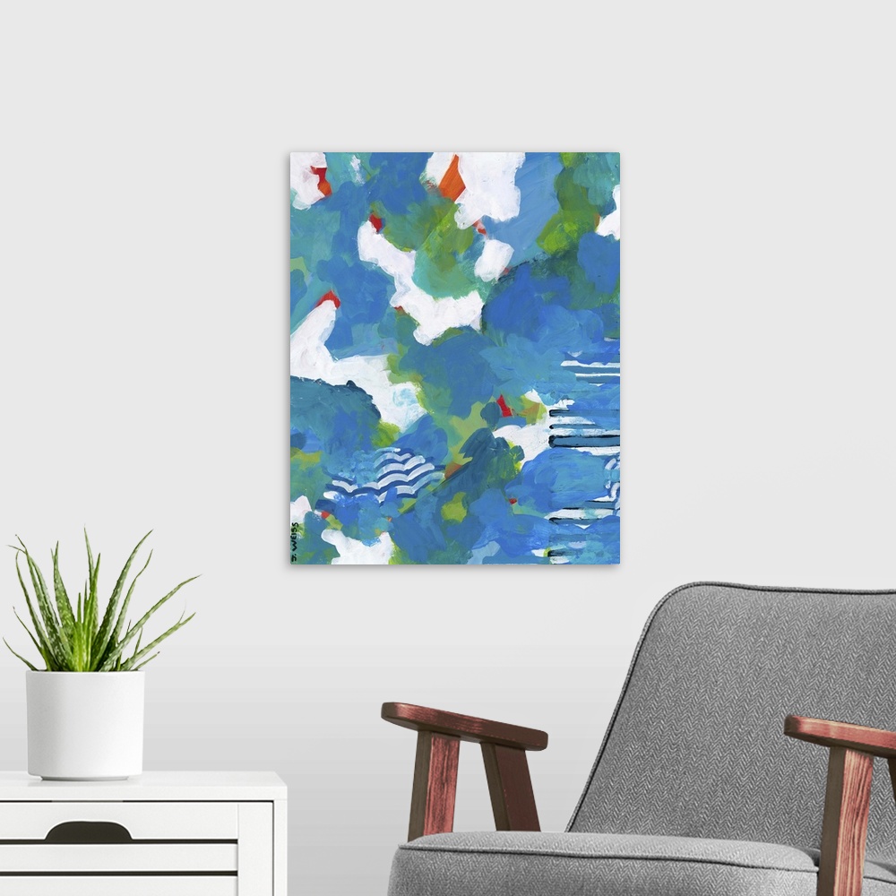 A modern room featuring Blue and white contemporary abstract painting reminiscent of the ocean.