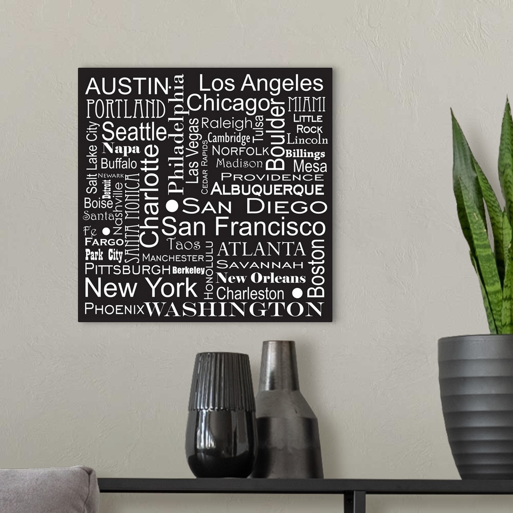 A modern room featuring a typgraphic depiction of cities that are most populated and most popular.