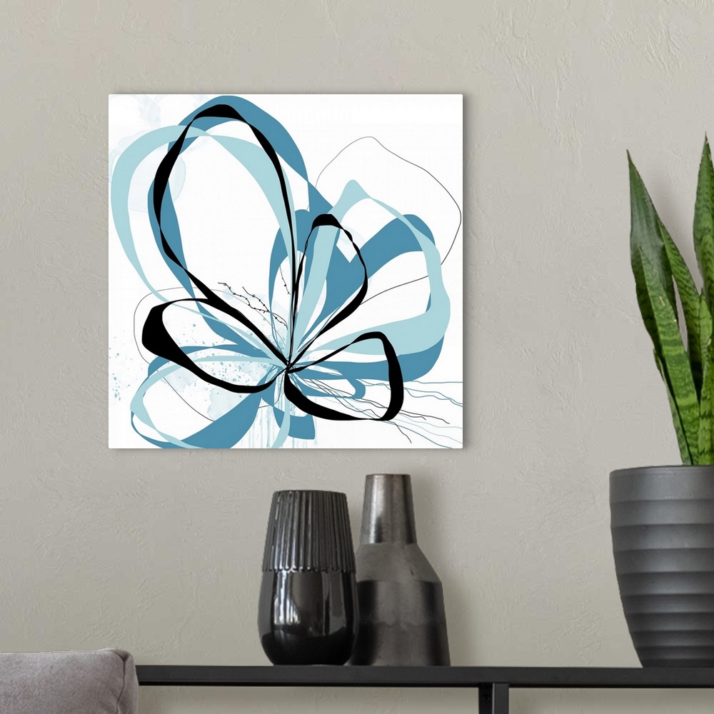 A modern room featuring A bright floral with flowing lines of intertwined colors like aqua, teal and black