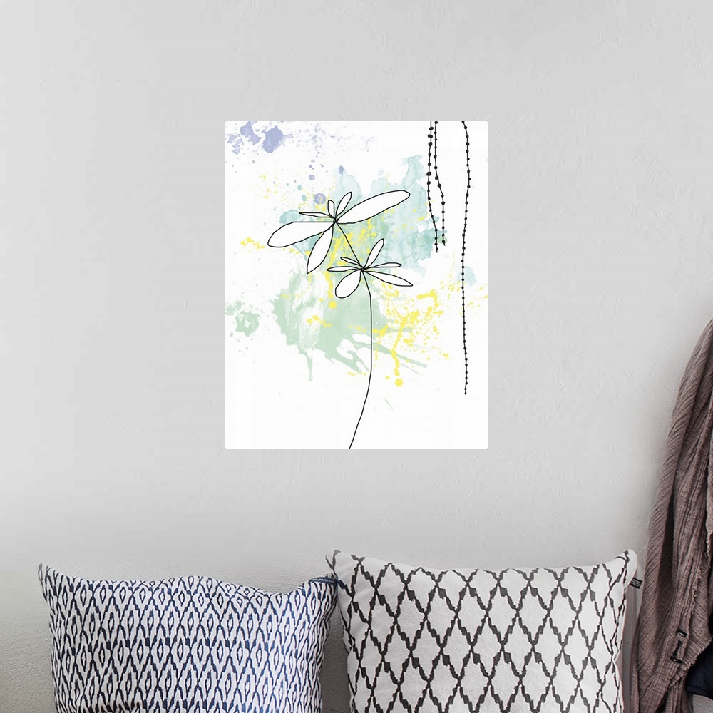 A bohemian room featuring Portrait, large art of paint splatters in pastel colors on a solid white background.  In front of...