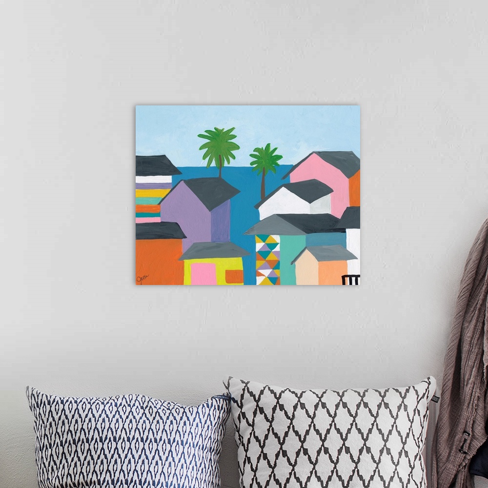 A bohemian room featuring Contemporary painting featuring several colorful houses on the coast, with the ocean and palm trees.